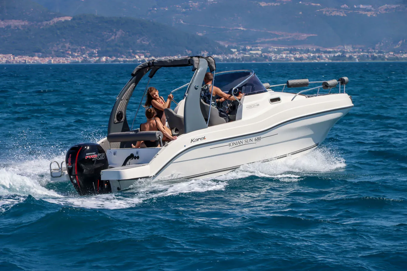 Karel Ionian Sun 680 motorboat underway